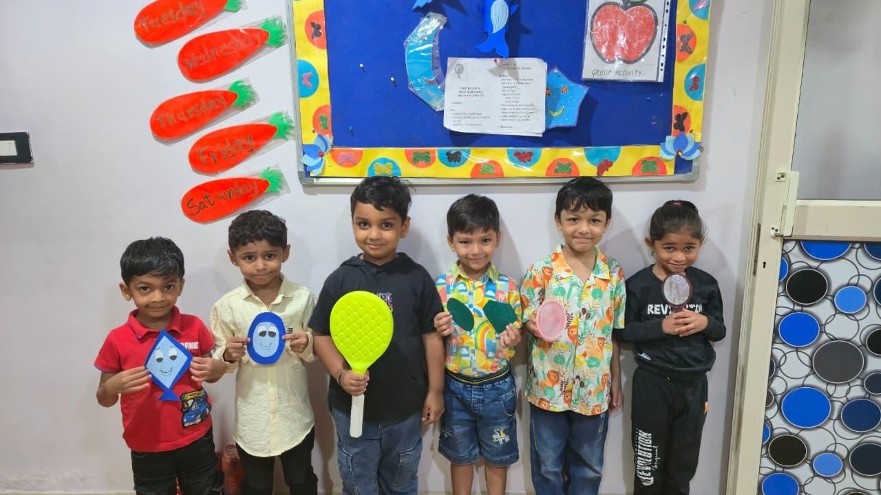 Children showing their craft work